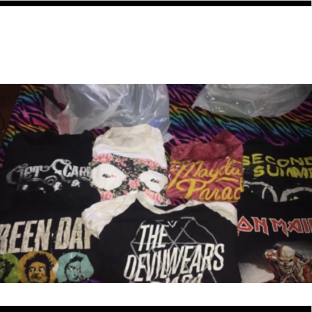 Sizes vary between m-2x each one $8 or 3 for 15.